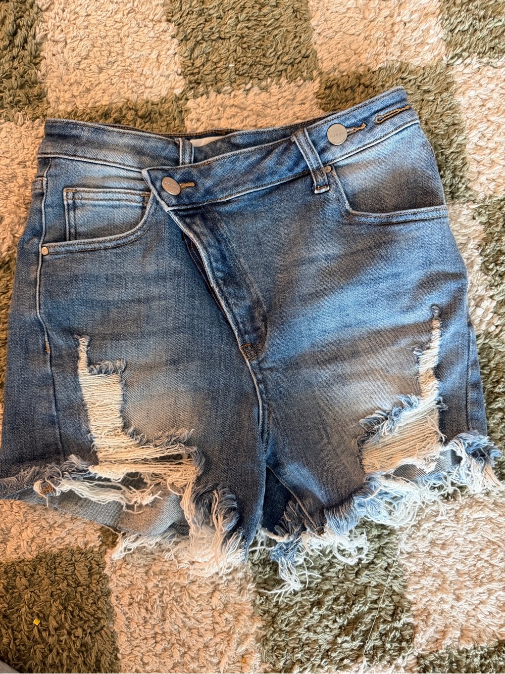 High-Rise Distressed Denim Shorts in Blue